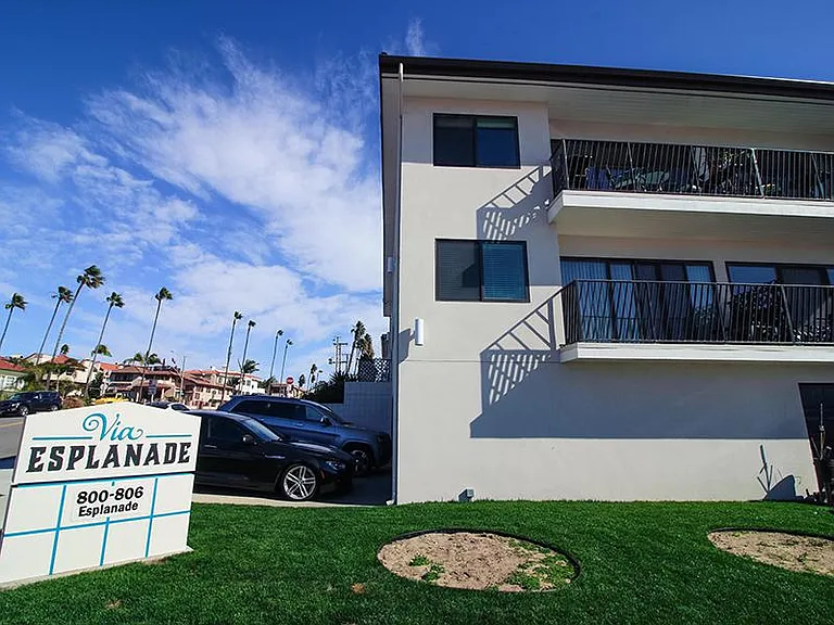 Via Esplanade Apartments Redondo Beach Exterior View of Sign and Balconies.
