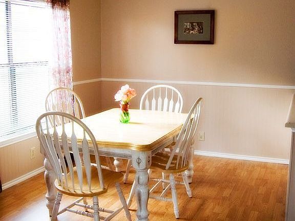 Eat in kitchen, new wood laminate and wainscoating/chair rail/paint