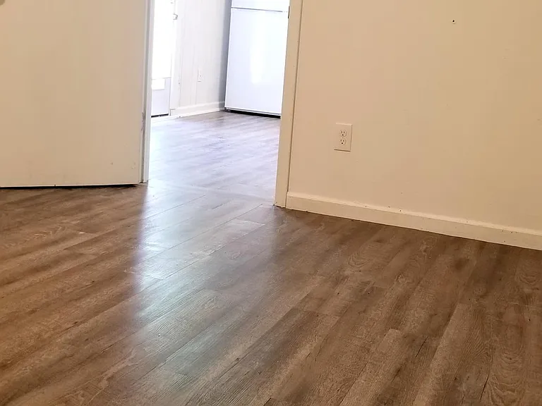 Bedroom looking towards kitchen/living area