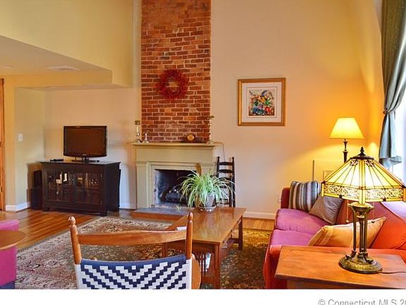 Living room area with firep...