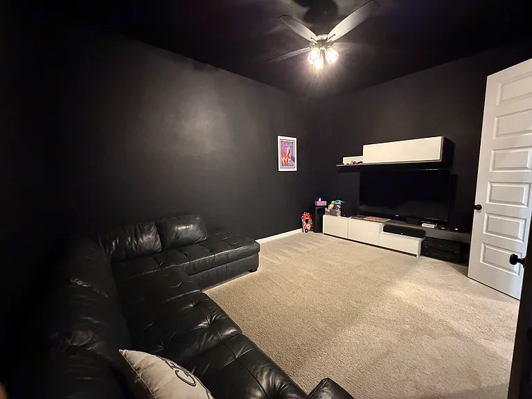 Blackout media room fits sectional