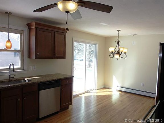 The kitchen dining area has...