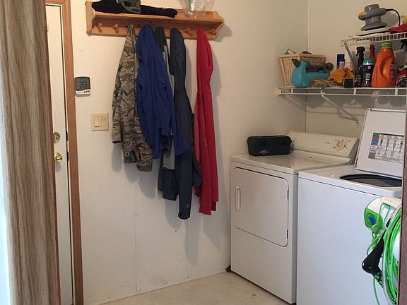 Mudroom with washer/dryer and deep freezer