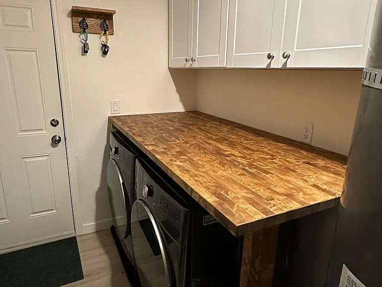 Mud room/laundry room with new LG washer and dryer