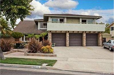 Mature landscaping welcomes you home.