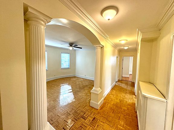 From the front door into the hallway and living room