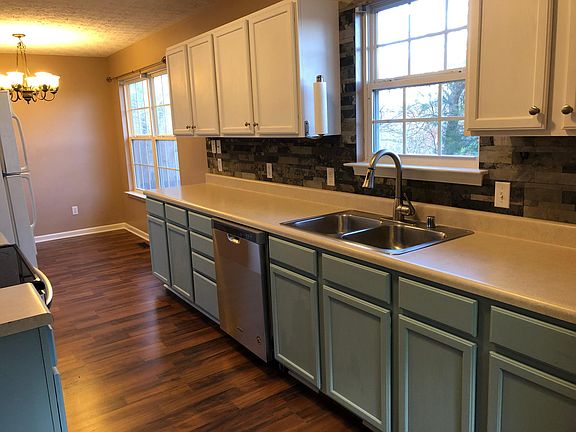 Kitchen and dining. New dishwasher. Peaceful window views.