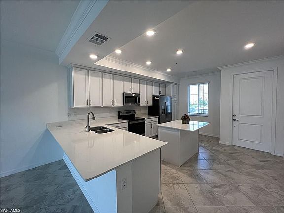 5th image of 6046 National Blvd #425