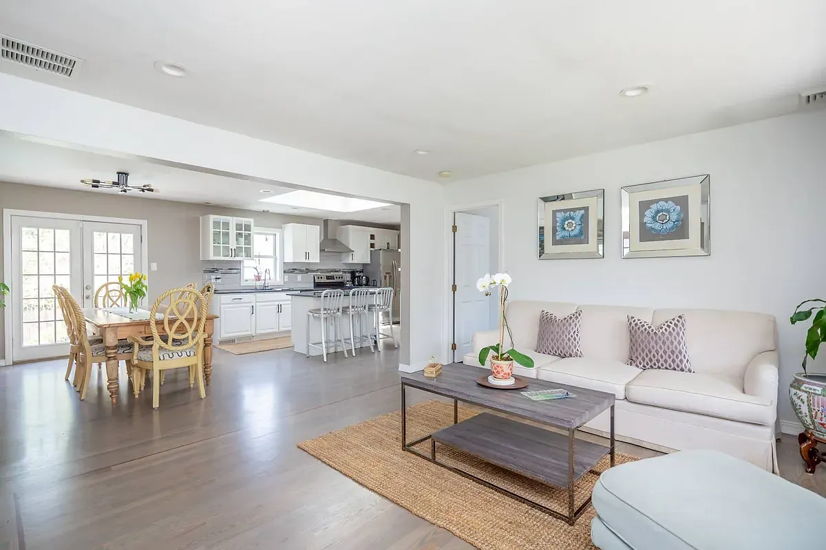 Experience Tranquility in East Hampton's Chic Ranch Oasis! — Photo 3