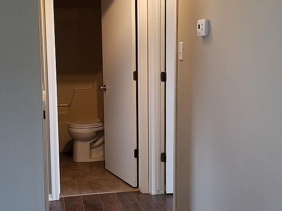 Hall to 1st bathroom. Bedroom 1 and 2 on each side of bathroom.