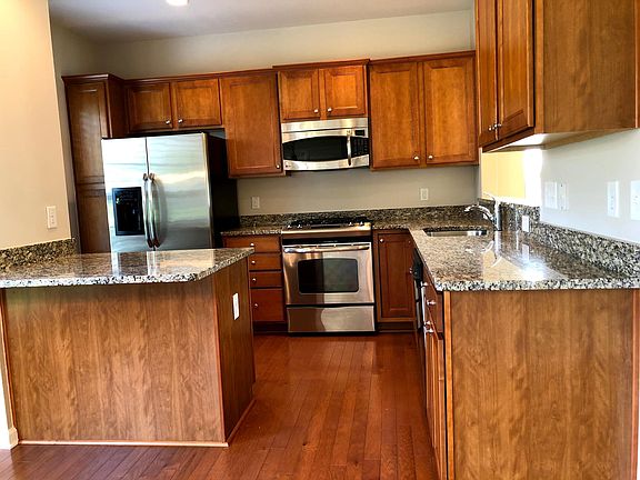 Like-new stainless steel appliances. Granite countertops. Gas Cooktop. Newly painted