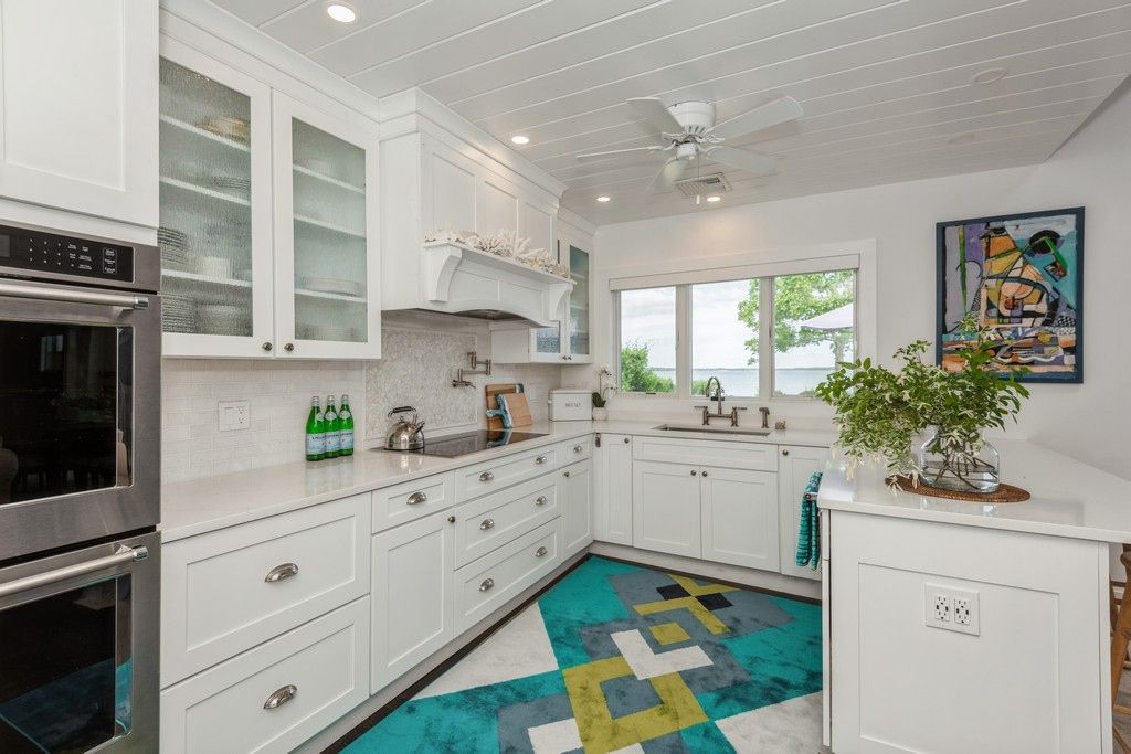 Brand New Bright and Breezy Chef's Kitchen. Original Artwork adds Pops Of Pleasing Color