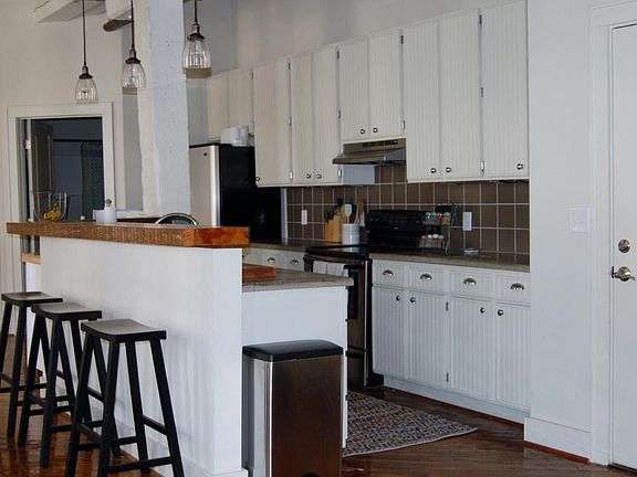 Kitchen with concrete countertops