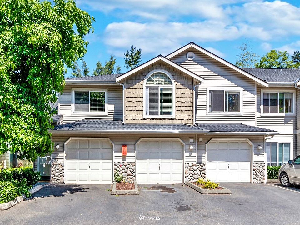 Enter along the left side of the building or through the garage