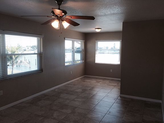 Stone like porcelain tile throughout