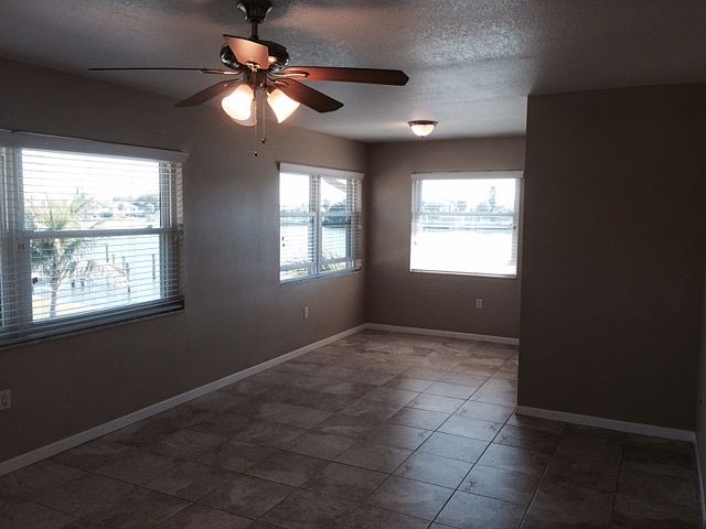 Stone like porcelain tile throughout