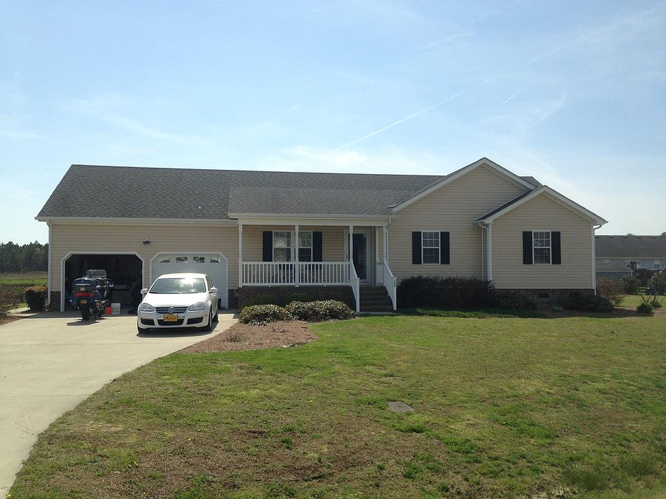 On 1/2 acre with shed and 2 car garage.