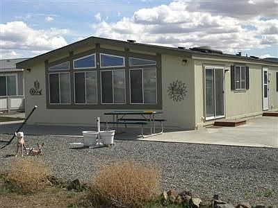 Looking from the golf course towards your patio