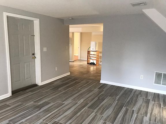 Living room looking towards kitchen