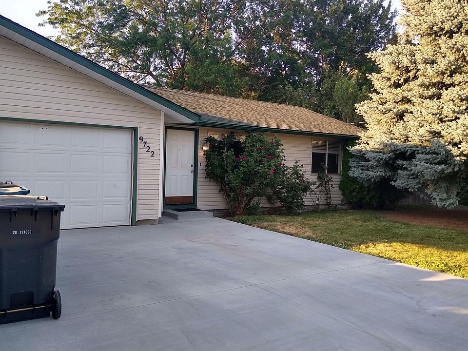 front of house and garage, roses in front and side