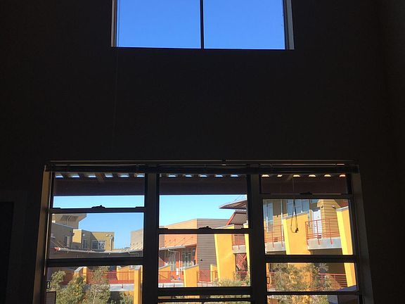 Always bright and sunny! High ceiling living room!