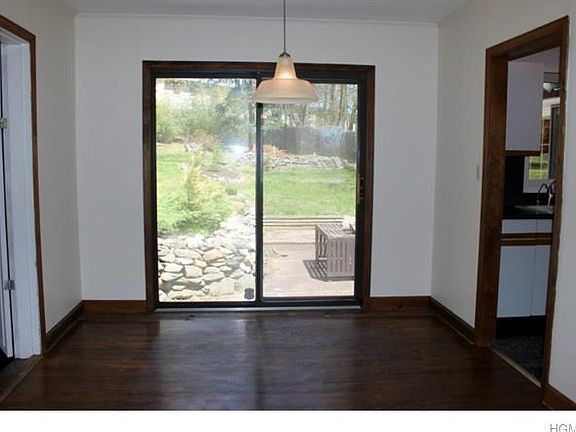Dining room with sliding glass door to patio.