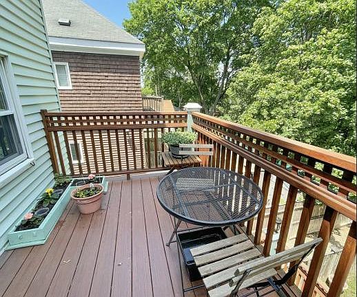 Rear porch overlooking community path, there's another porch in the front.