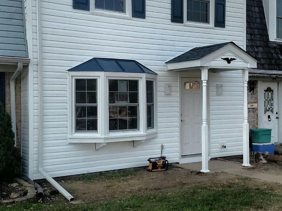 Street view, has new siding and roofing