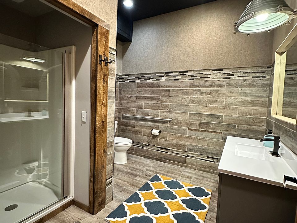 Industrial-modern tile accent bath design