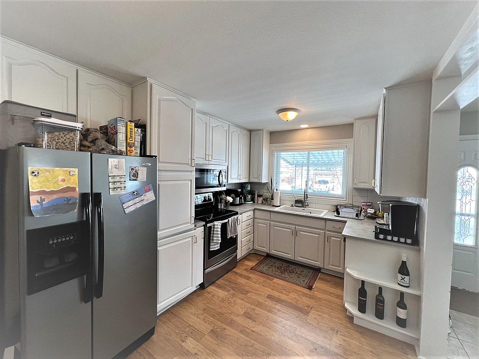 Newly remodeled kitchen with lots of cabinet storage (includes dishwasher -just not seen in this picture but is located on the right side cabinet area).
