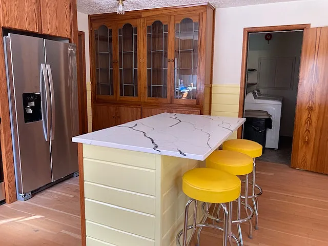 Kitchen island to laundry.