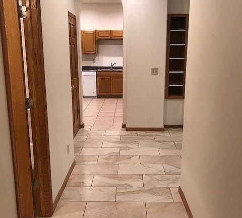 From the hallway looking into kitchen Living room is off to the left.