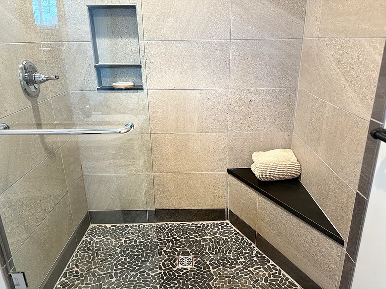 Master bedroom shower and bench
