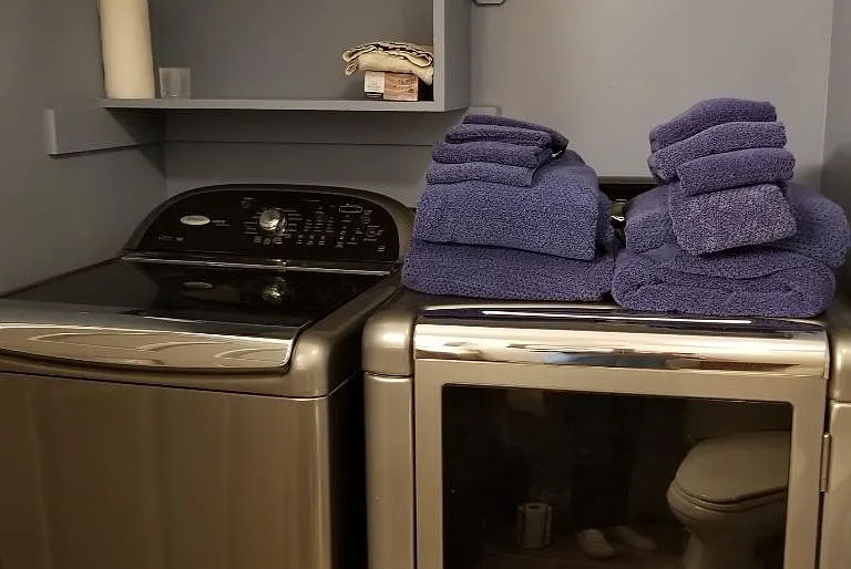 Full size washer and dryer in first floor bathroom.