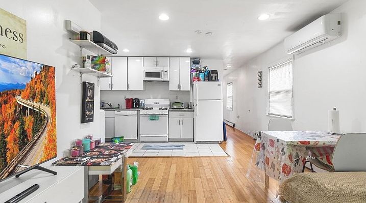 1st image of 1555 E 98th St #2