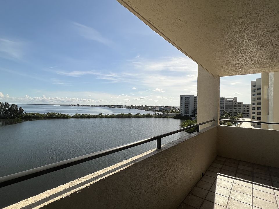 Private balcony and view of the Gulf and lagoon with private beach