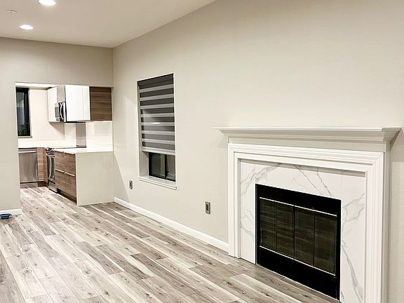 Spacious open concept dining room area and fireplace