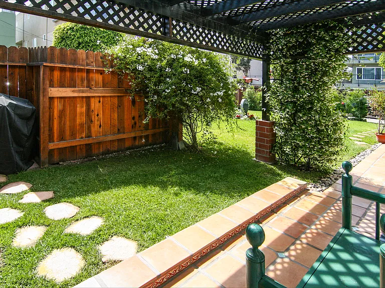 Gas Grill Nook - covered grill (left). Looking out toward yard (right)