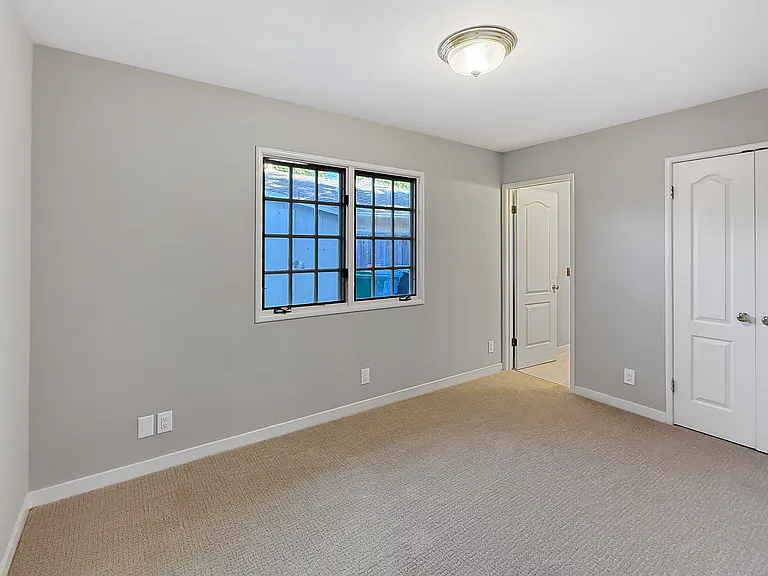 Downstairs Bedroom - Unstaged