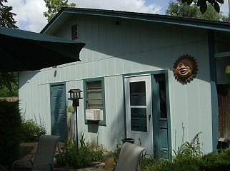 3+ car garage/shop heated with 1/2 bath and office