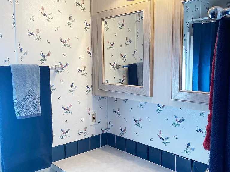 Bathroom with has tub and hot water on demand so it always stays hot.
