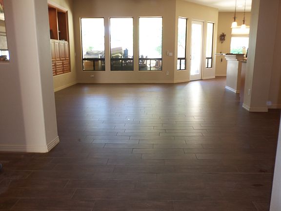 Wood-look tile throughout