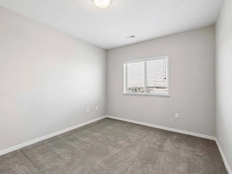 Whether you're creating a guest room, home office, or personal retreat, this versatile bedroom offers a comfortable space to make your own.