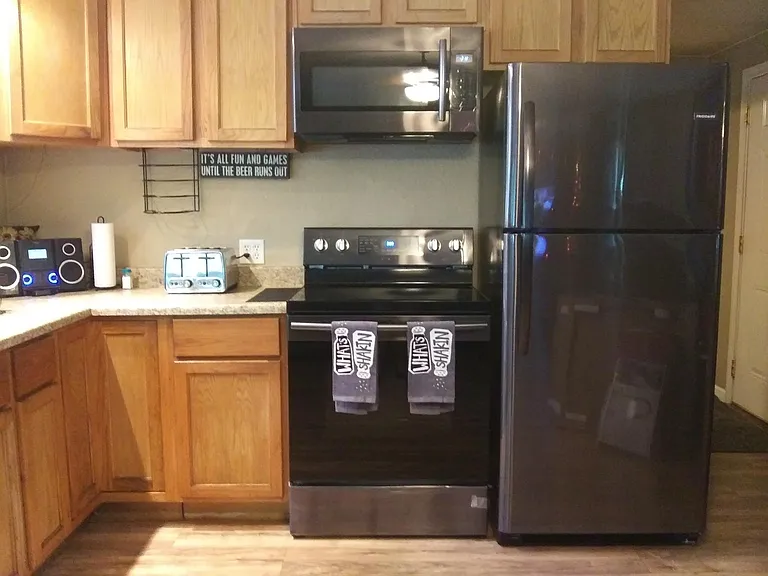 Open kitchen with appliance suite