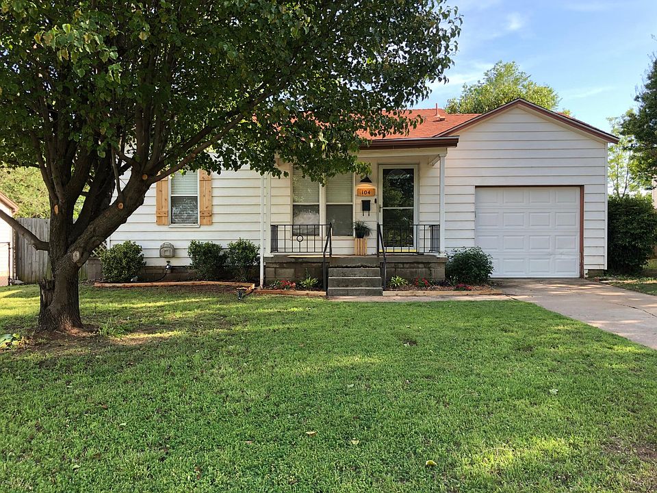 Beautiful Cedar Shutters and Flower Bed!