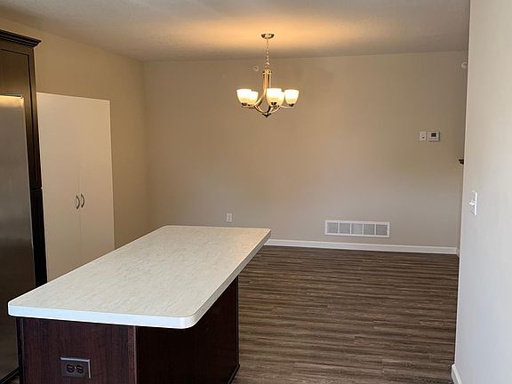 View to Dining Room from Kitchen. Lots of Space To Enjoy a Nice Meal Together!
