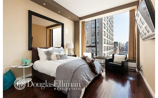 Sold by Douglas Elliman | media 18