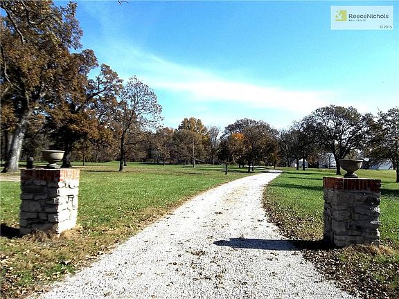 Private lane to home nestled among the trees.