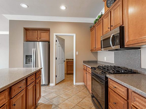 5th image of 12161 E 34th Pl