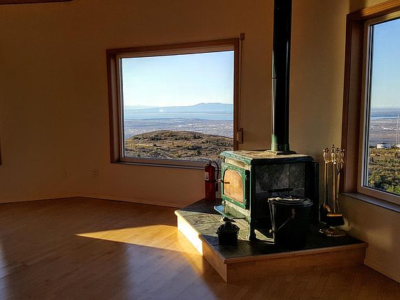 Living Room with Wood Stove & Inlet View
